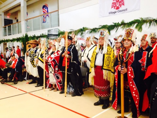 Heiltsuk Hemas standing with Haida Hereditary Chiefs