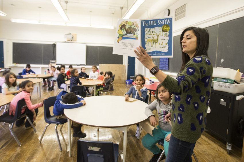 Teacher Maliha Mitha reads to her Grade 1 and 2 class at First Nations School of Toronto during the children's first week at the new site.